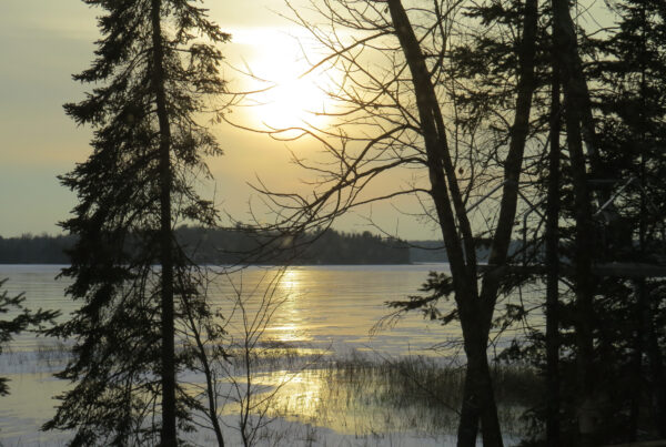 Winter -- Winter Sun over a Frozen Lake